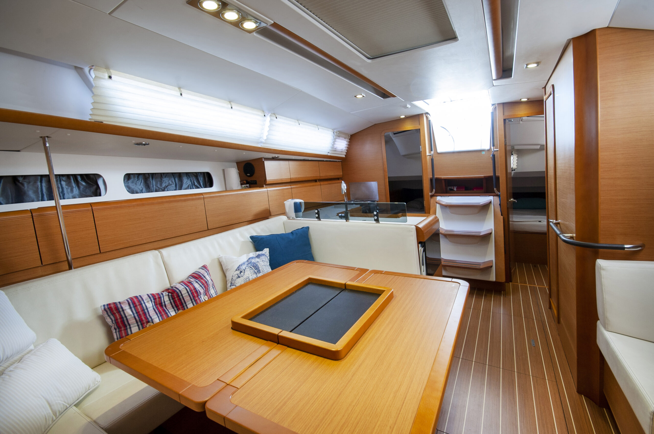 Cozy yacht living space with cushions