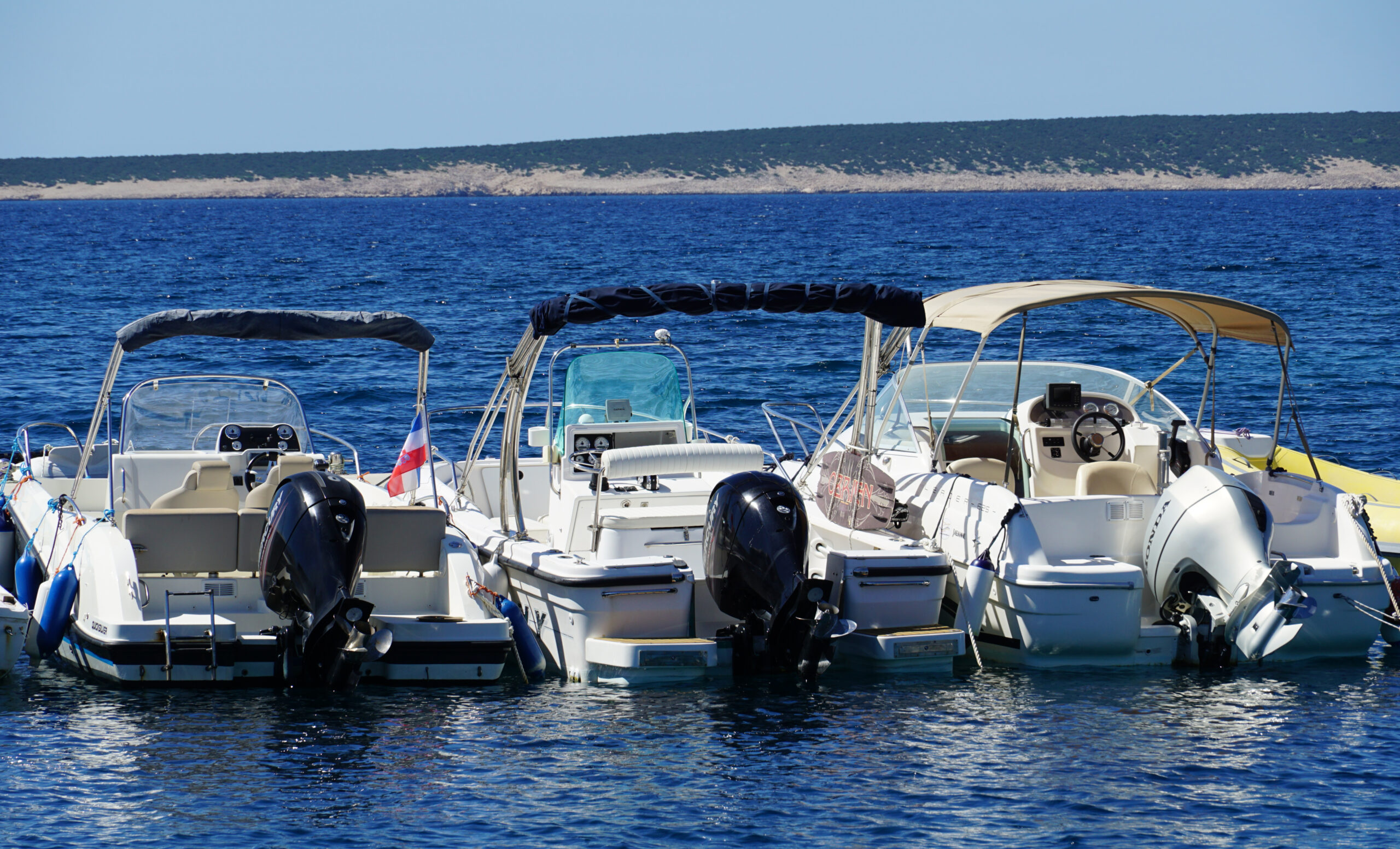 Boats docked on a sunny day
