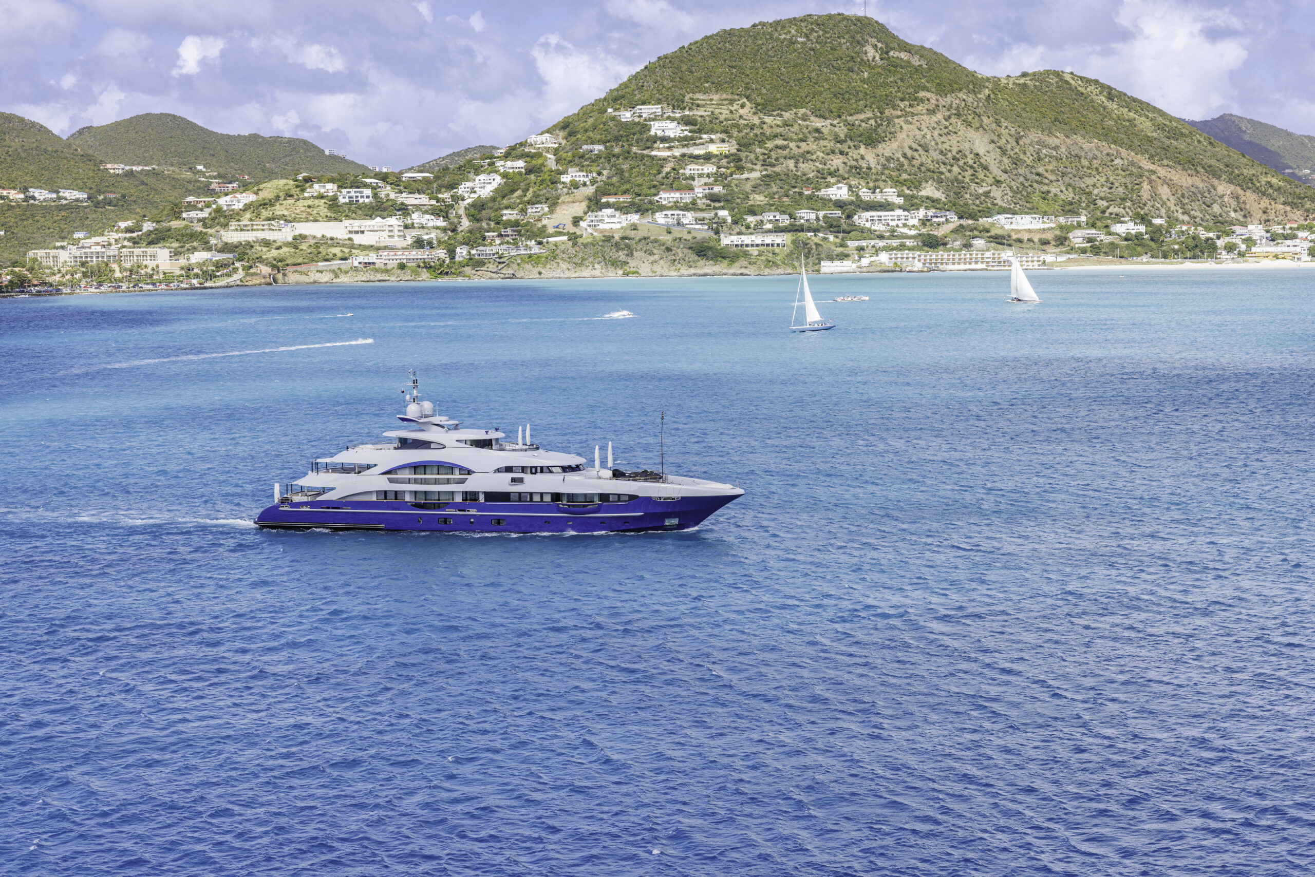 Yacht cruising in turquoise Caribbean waters