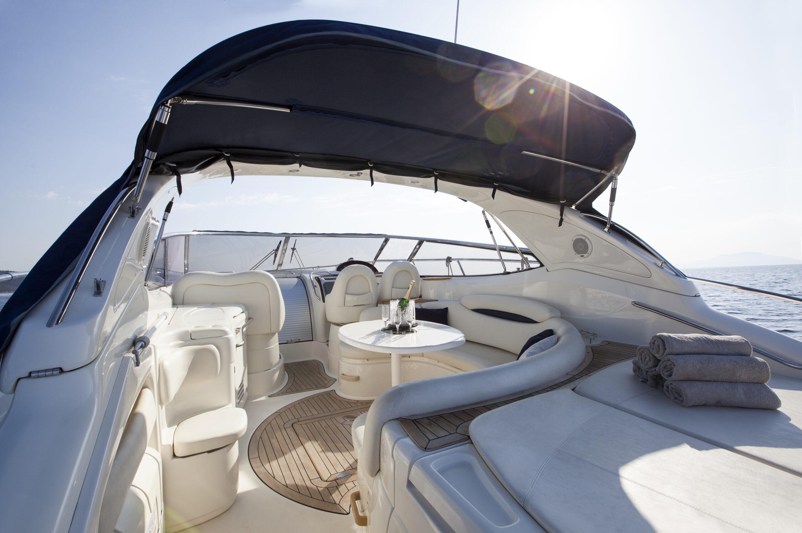 Relaxing yacht deck under blue canopy