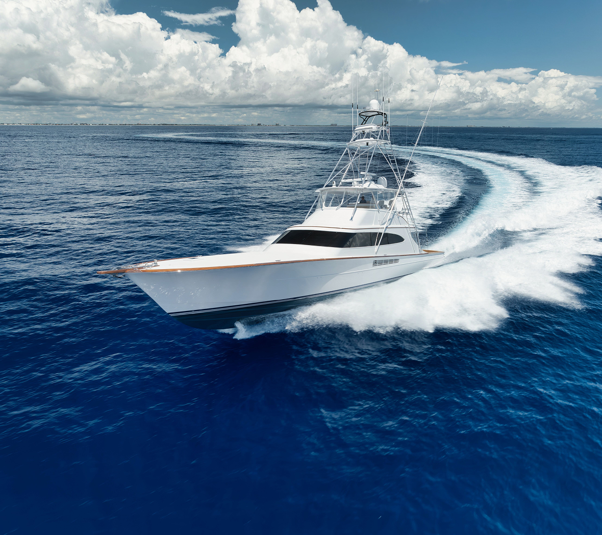 Boat navigating through blue waters